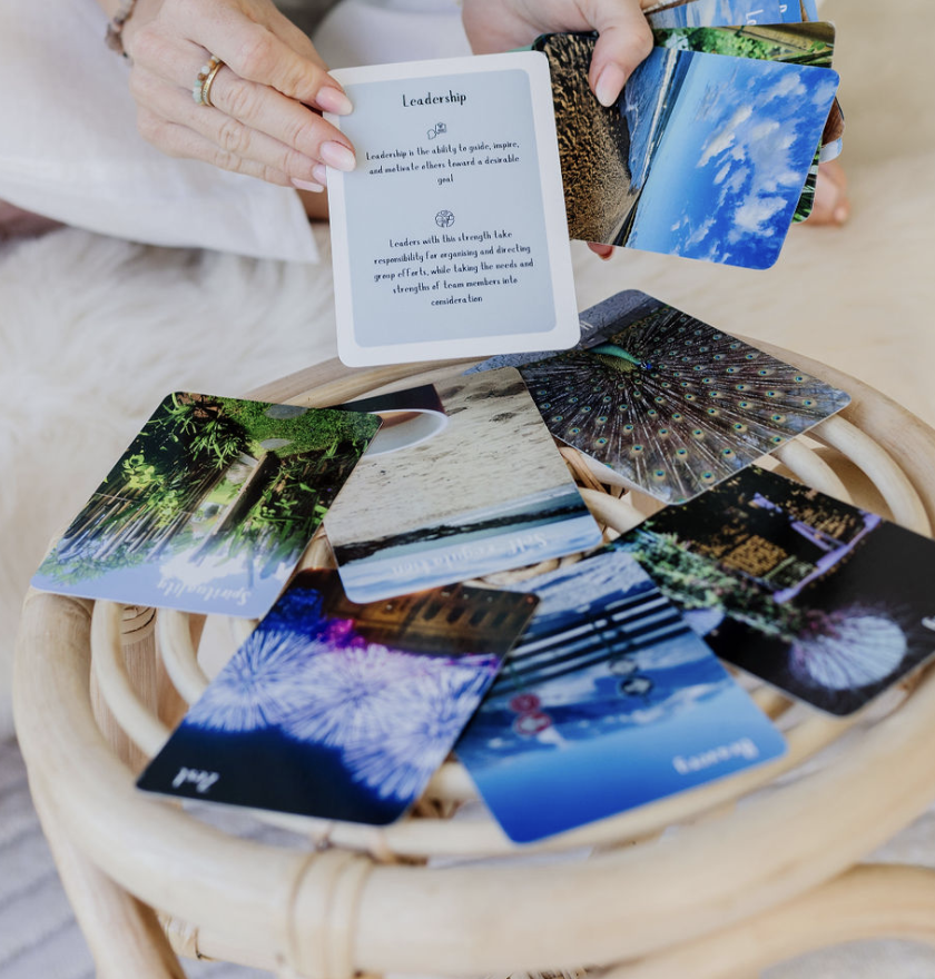 Sarah holding Flow strengths cards