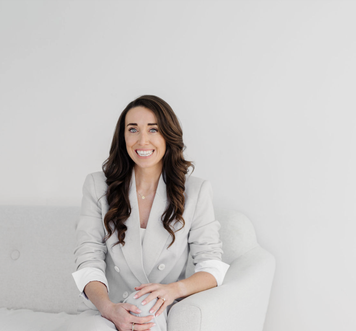 Sarah Curran, professional portrait in grey suit